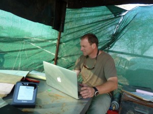 Chris Nelson validating gas data on site in the Kalihari desert, Botswana