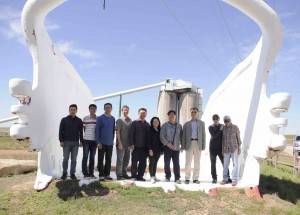 Field trip participants and leaders, standing in an old drag line bucket from one of the mines, Powder River Basin, Wyoming