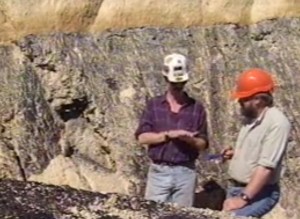 Tim Moore talking to Bill Spicer about ancient peats at the Kaitangata coal mine, South Island, New Zealand (1996).